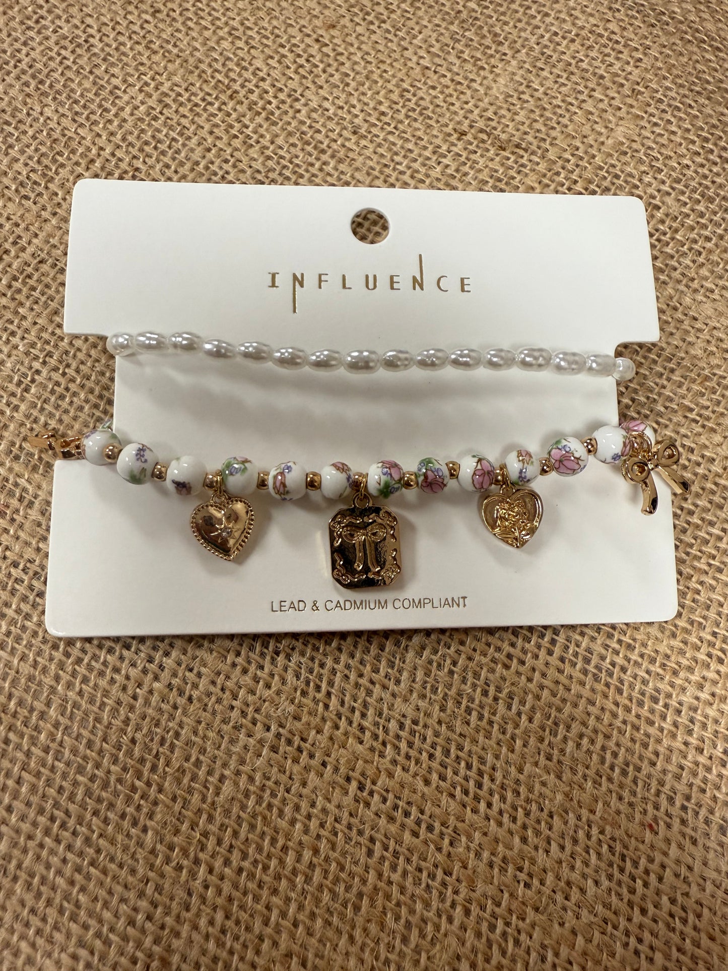 Double pearl floral charm