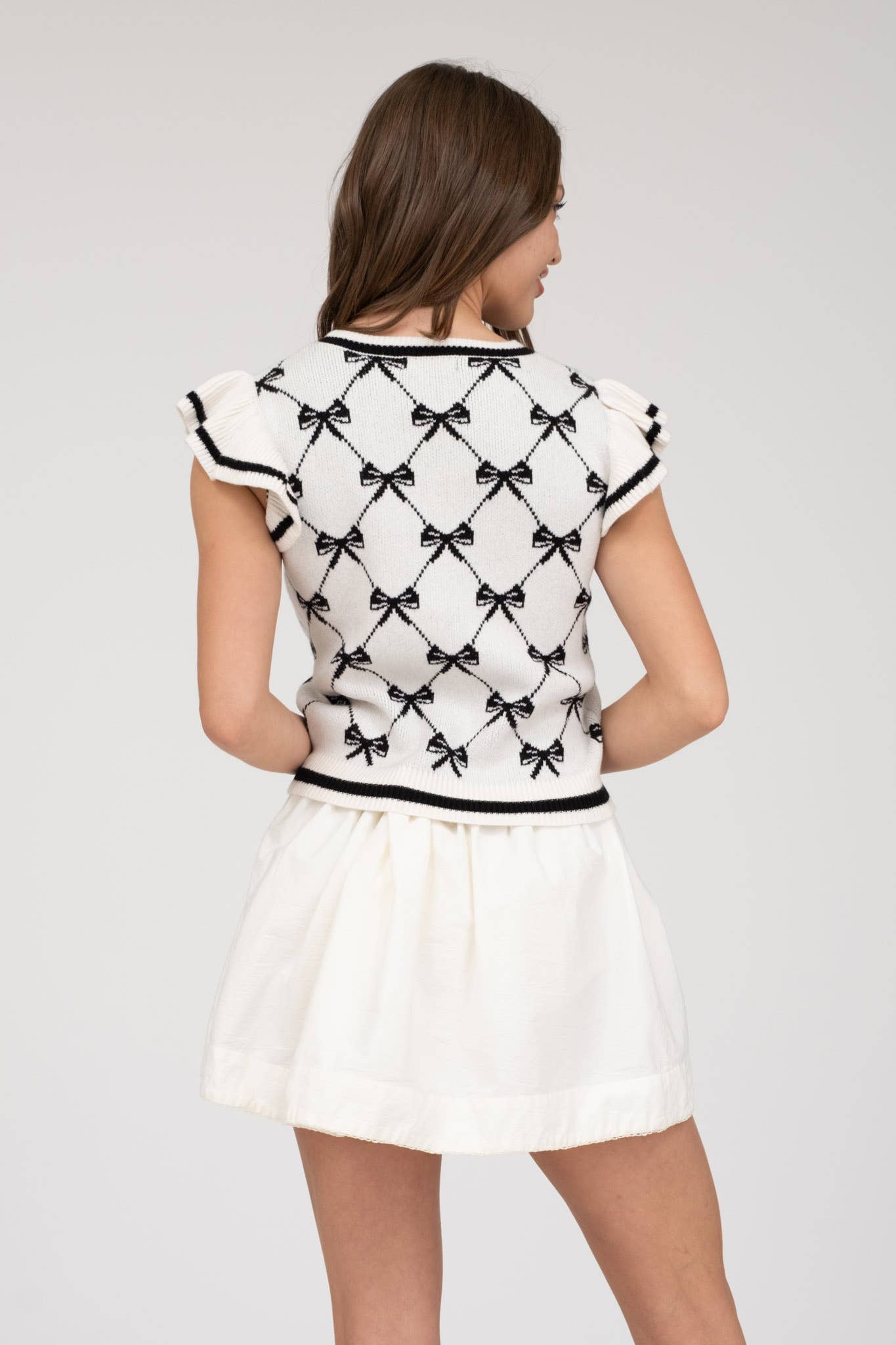 BOW PATTERN RUFFLE SLEEVE SWEATER KNIT TOP: IVORY