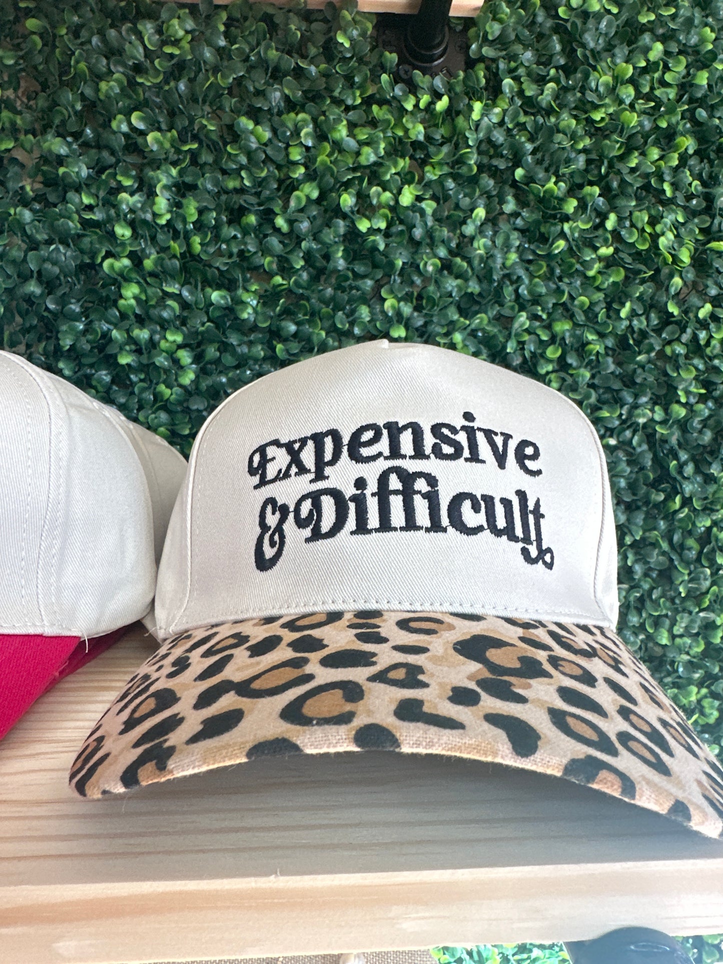 EXPENSIVE AND DIFFICULT HAT
