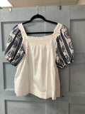 EYE OF THE STORM TOP