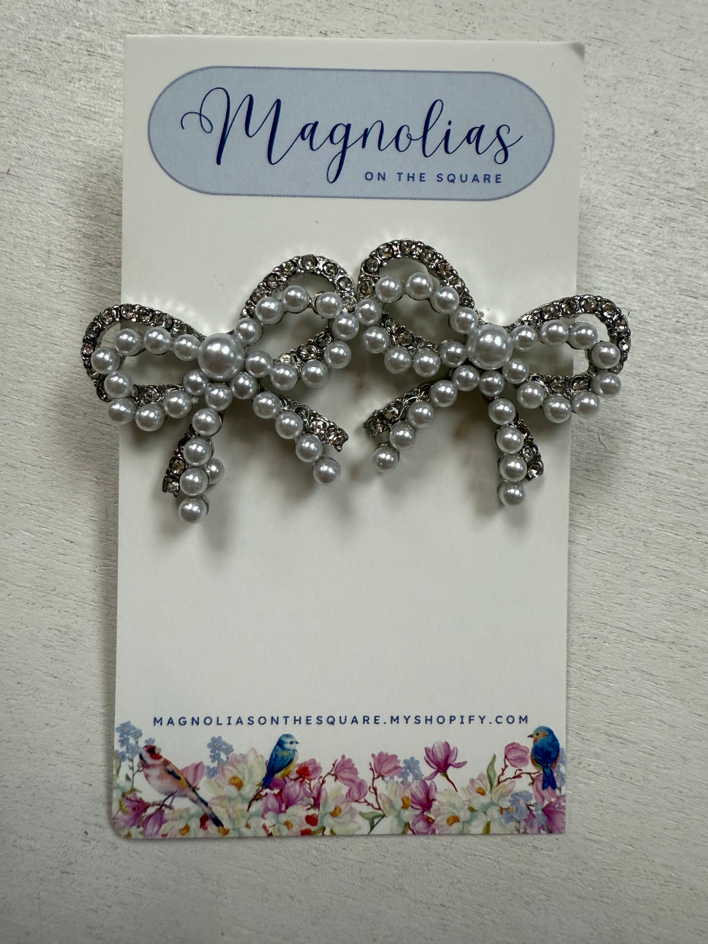 Pearl sparkle bow earrings