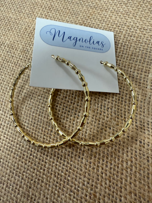 Shiny gold hoops