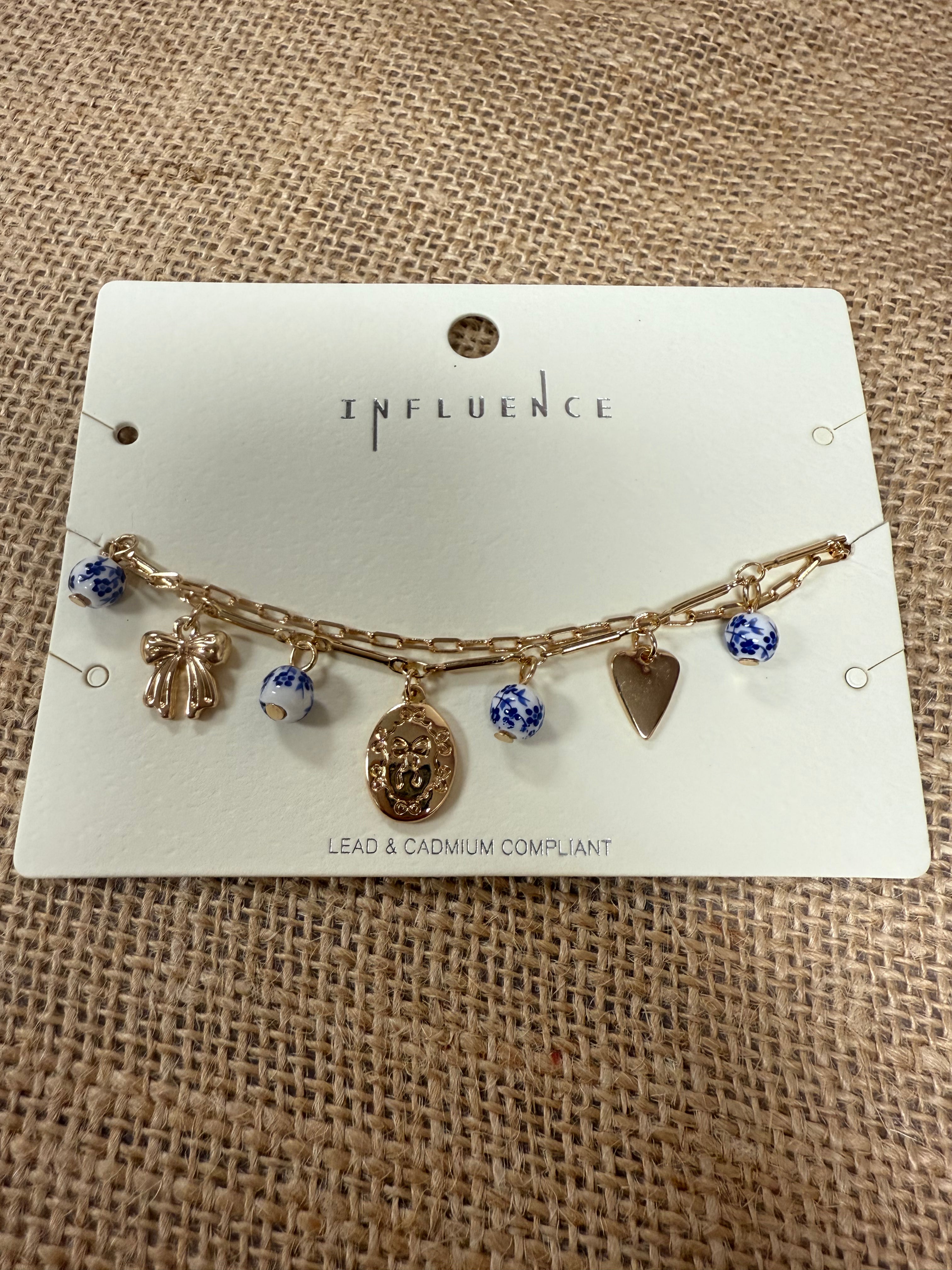 Blue gold charm bracelet